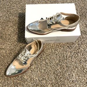 Metallic Silver and Transparent Dress Shoe from Aldo Shoes in size US 8